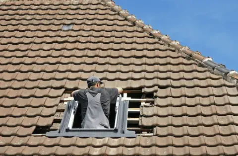 Pose de velux à Pont l'Abbé d'Arnoult